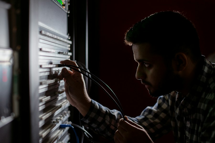 Technician maintaining server hardware